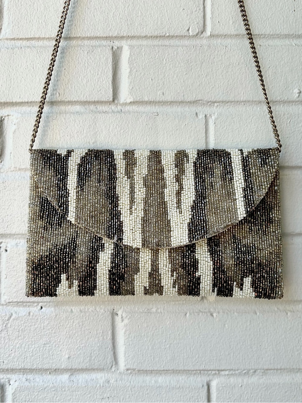 Tiana‎ New York Handbeaded Envelope Crossbody Clutch, Neutral Ikat Pattern